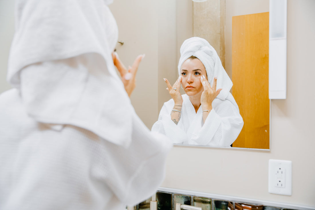 Applying SaGrah Beauty serum