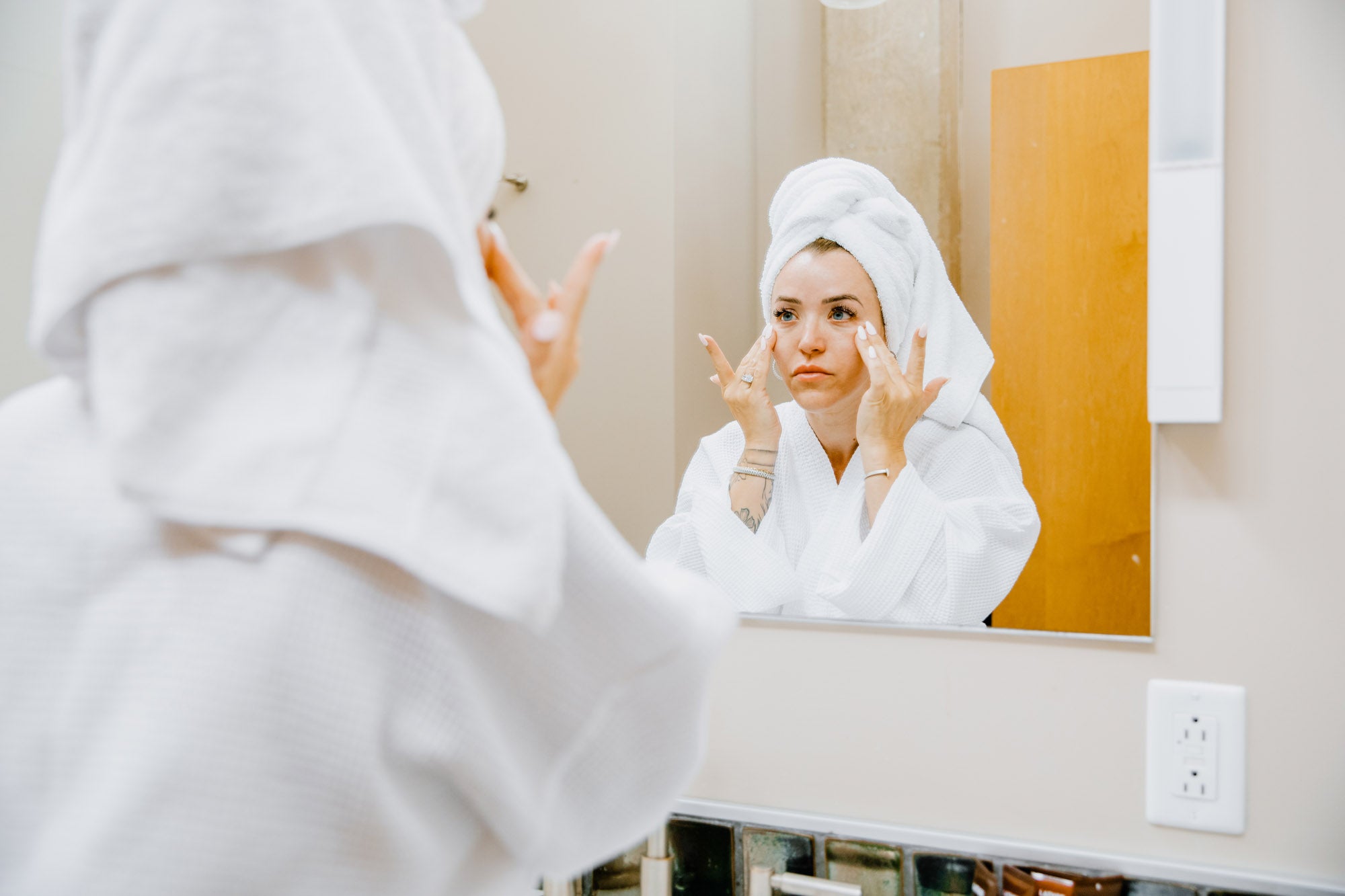 Applying SaGrah Beauty serum